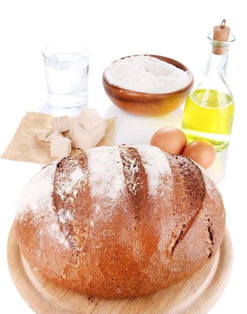 Baking bread on wooden table